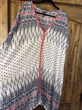 Swimsuits For All navy blue label with pink accents